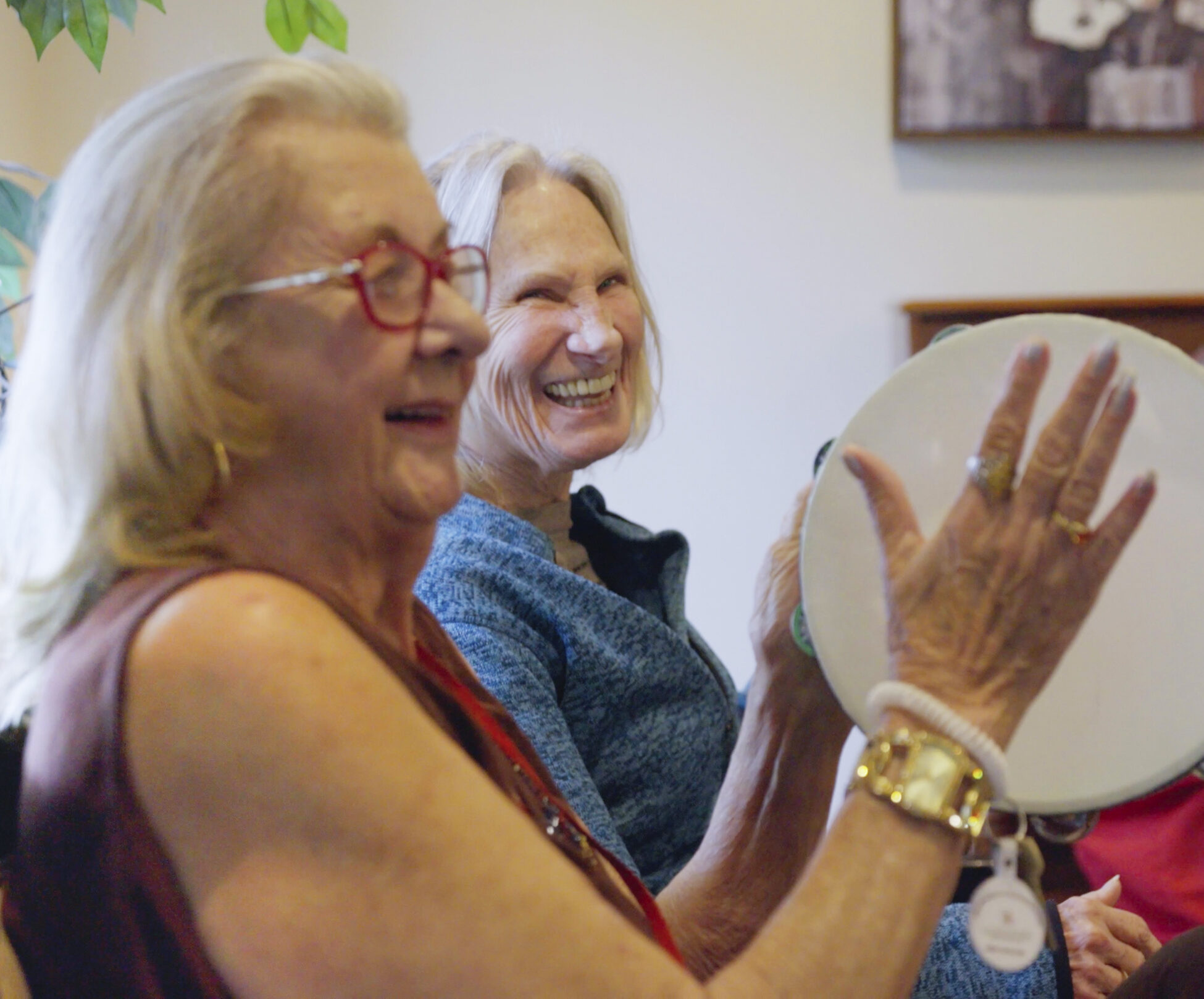 Women playing tambourine