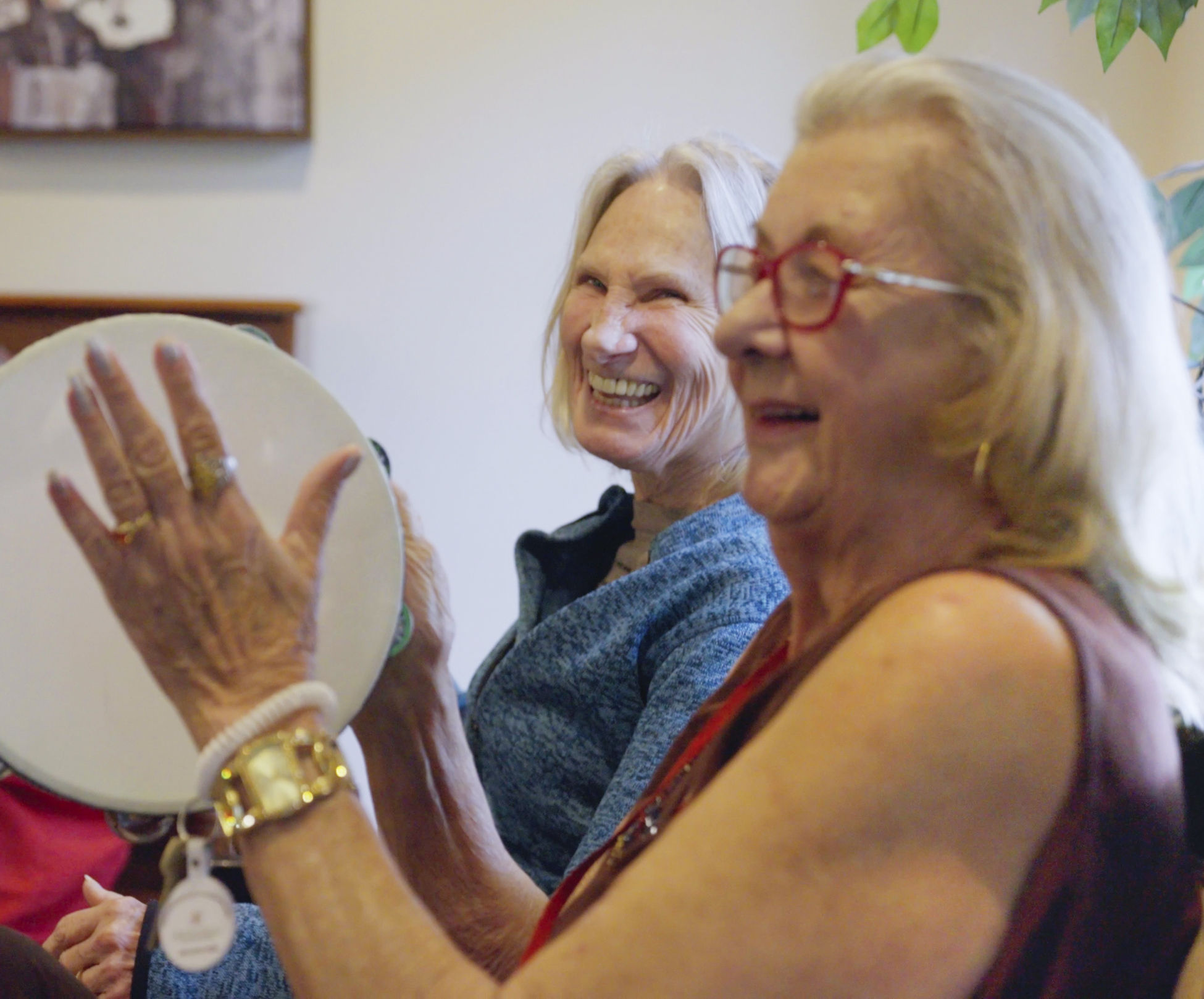 Women Playing tamberine
