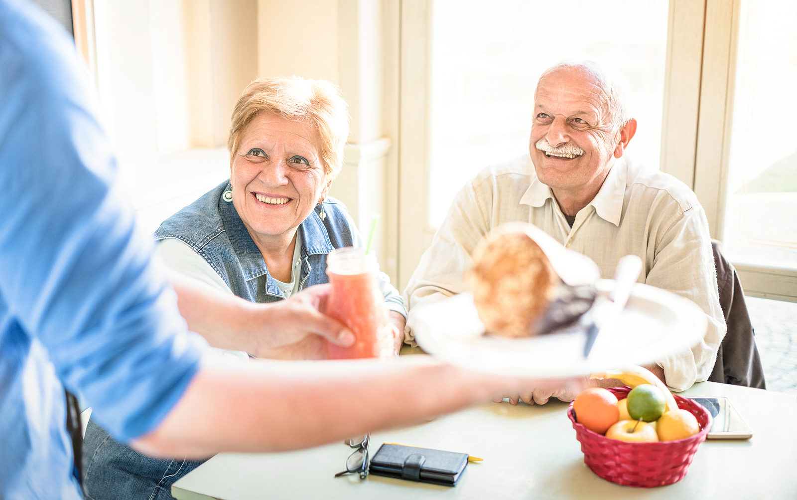 senior couple sharing a meal together